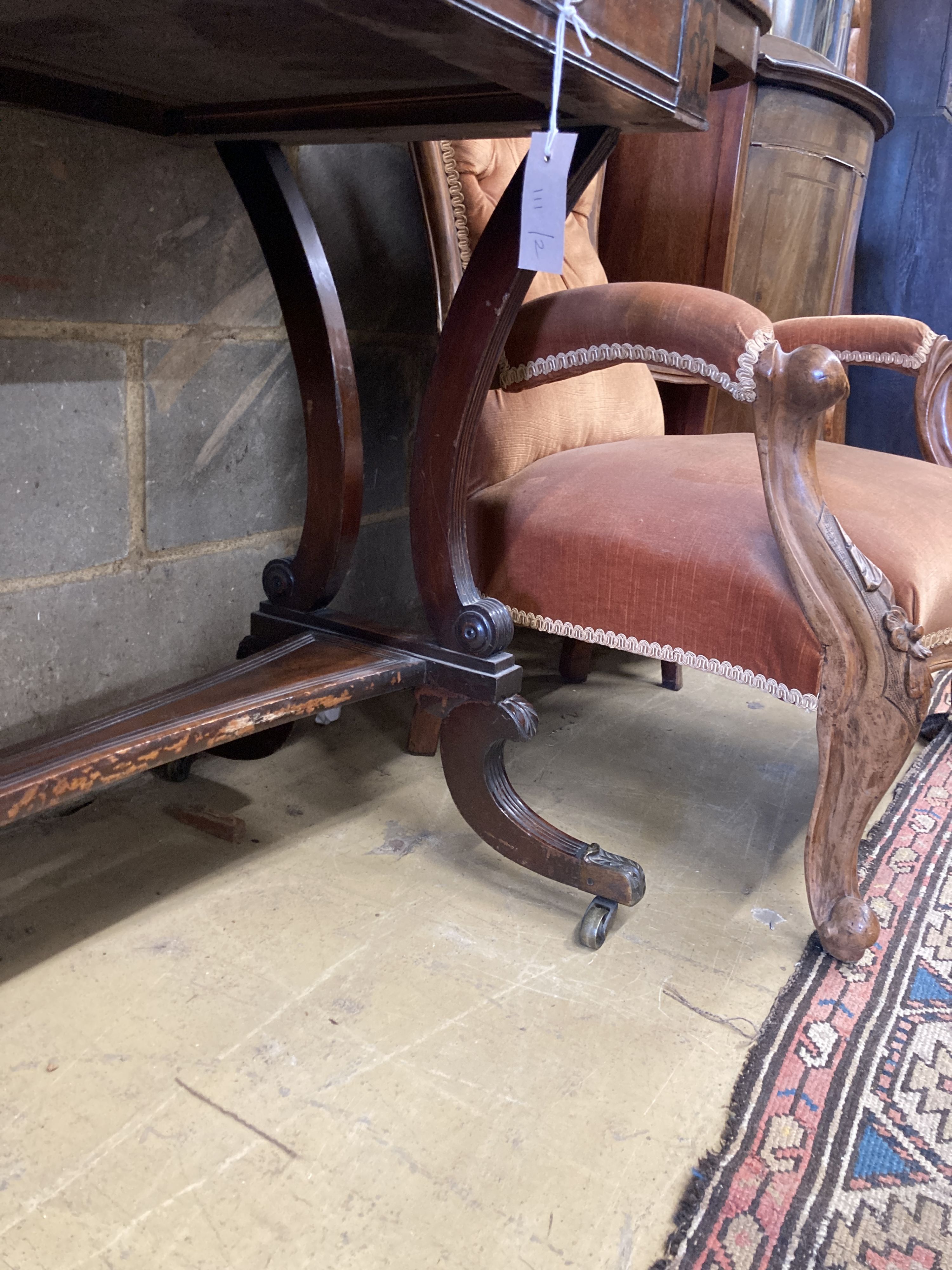 A Regency banded and ebony inlaid walnut writing table, width 106cm, depth 52cm, height 73cm